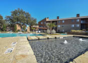 Thumbnail 8 of 28 - Outdoor Heated Saltwater Pool With Hot Tub Open Year-Round at Century Park, Dallas, Texas