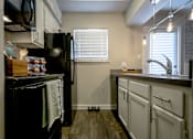Thumbnail 24 of 26 - Well Equipped Kitchen at The Hamptons, Dallas, TX
