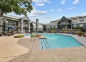 Thumbnail 5 of 56 - Swimming Pool With Relaxing Sundecks at 5636 Apartment Homes, Dallas, TX, 75254