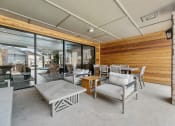 Thumbnail 17 of 50 - a covered patio with chairs and tables at The Hills at Ironhorse, North Richland Hills, TX