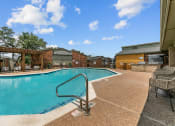 Thumbnail 14 of 50 - Swimming pool area at The Hills at Ironhorse, North Richland Hills, TX