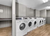 Thumbnail 42 of 50 - our apartments have a laundry room with a washer and dryer at The Hills at Ironhorse, North Richland Hills, TX, 76180