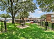 Thumbnail 30 of 50 - our apartments offer a dog park with a picnic table at The Hills at Ironhorse, North Richland Hills