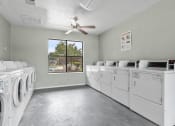 Thumbnail 35 of 47 - our apartments have a laundry room with washer and dryer at The Hudson, North Richland Hills, TX, 76180