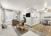 Thumbnail 30 of 56 - a living room with a couch and a table at 5636 Apartment Homes, Dallas, TX, 75254