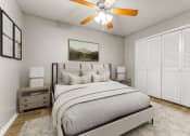 Thumbnail 38 of 56 - a bedroom with a bed and a ceiling fan at 5636 Apartment Homes, Dallas, TX