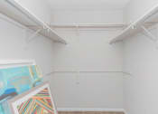 Thumbnail 46 of 68 - a white room with paintings and white hangers on the wall at The Escapade, San Antonio, 78216
