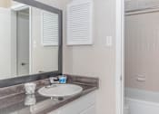 Thumbnail 48 of 68 - a bathroom with a sink and a mirror at The Escapade, Texas