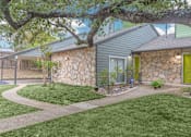 Thumbnail 33 of 68 - a side view of a house with a green door at The Escapade, Texas