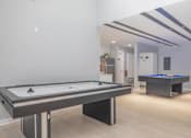 Thumbnail 23 of 68 - a game room with two pool tables and a foosball at The Escapade, San Antonio, 78216