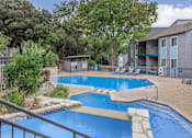 Thumbnail 16 of 63 - our apartments have a swimming pool and a patio with chairs at The Keller, Texas  