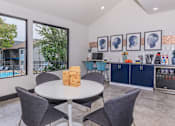 Thumbnail 20 of 63 - a dining area with a table and chairs and a kitchen with a pool at The Keller, San Antonio, TX  