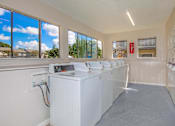 Thumbnail 39 of 68 - the laundry room is equipped with washers and dryers at The Escapade, San Antonio, 78216
