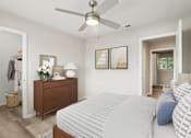 Thumbnail 14 of 68 - a bedroom with a large bed and a ceiling fan at The Escapade, San Antonio, Texas