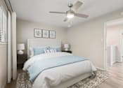 Thumbnail 8 of 68 - a bedroom with a bed and a ceiling fan at The Escapade, San Antonio, 78216