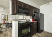 Thumbnail 50 of 60 - Classic Kitchen with Black Appliances
