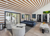 Thumbnail 2 of 60 - Living room with couch at Maxwell Townhomes, San Antonio, TX, 78230