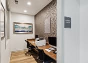Thumbnail 16 of 47 - Our resident business center with two desks and a computer