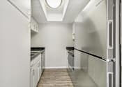 Thumbnail 68 of 68 - a kitchen with white cabinets and stainless steel appliances at The Escapade, San Antonio, 78216