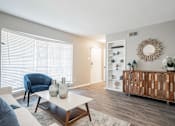 Thumbnail 7 of 41 - a living room with a couch and a coffee table at Aero White Rock, Texas