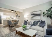Thumbnail 1 of 41 - a living room with a couch and a table at Aero White Rock, Dallas, TX