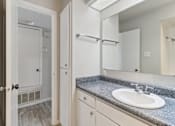 Thumbnail 55 of 68 - a bathroom with a sink and a mirror and a shower at The Escapade, San Antonio, 78216