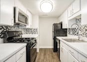Thumbnail 33 of 41 - Fully Furnished Kitchen at Aero White Rock, Dallas