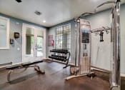 Thumbnail 20 of 47 - the gym has plenty of equipment and a large window