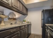 Thumbnail 16 of 28 - Fully Equipped Kitchen at Century Park, Texas, 75254