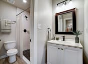 Thumbnail 24 of 54 - a bathroom with a toilet sink and shower at The Frederick, Texas