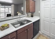 Thumbnail 24 of 28 - A kitchen with brown cabinets and a white sink.