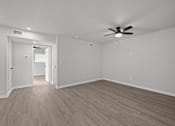 Thumbnail 71 of 79 - Unit image of renovated bedroom with vinyl flooring at Sunset Heights, San Antonio, TX