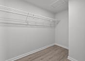 Thumbnail 70 of 79 - an empty bedroom with white walls and a white closet with a white rack on top at Sunset Heights, Texas, 78209