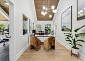 Thumbnail 19 of 20 - Modern home office with wood ceiling detail at Knoll Crest Apartments, San Antonio, Texas