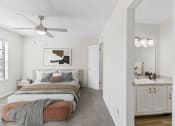 Thumbnail 44 of 47 - a bedroom with a bed and a ceiling fan at The Hudson, North Richland Hills