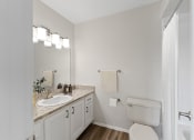 Thumbnail 45 of 47 - a bathroom with a toilet sink and shower at The Hudson, Texas, 76180
