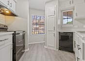 Thumbnail 33 of 38 - Kitchen area at Polo Clubs Apartments, Austin, TX