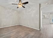 Thumbnail 29 of 38 - the living room with a ceiling fan at Polo Clubs Apartments, Austin, TX 78729