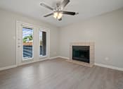 Thumbnail 34 of 38 - living room with a fireplace at Polo Clubs Apartments, Texas