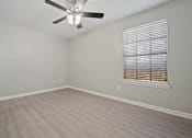 Thumbnail 36 of 38 - Bedroom with window at Polo Clubs Apartments, Austin, TX 78729