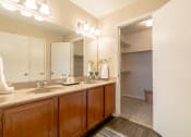 Thumbnail 18 of 21 - Bathroom with vanity at Amberly Village Townhomes, Garland, 75040