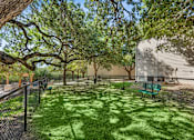 Thumbnail 35 of 40 - backyard with a green lawn at Crosspoint Oaks at Boerne, Boerne, TX 78006  