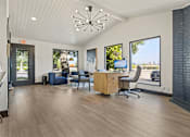 Thumbnail 4 of 45 - A room with a wooden floor and a ceiling light fixture. at Tradewinds, Windcrest