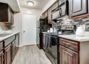 Thumbnail 47 of 47 - Gorgeous Kitchen with Black Appliances at The Hudson, Texas, 76180