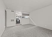 Thumbnail 38 of 43 - A large, empty room with a carpeted floor and white walls.at Rock 35, Texas