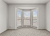 Thumbnail 17 of 43 - A room with a carpeted floor and a window with blinds.at Rock 35, Texas