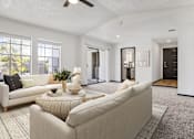 Thumbnail 21 of 45 - a living room with couches and a coffee table at Tradewinds, Windcrest, TX, 78239