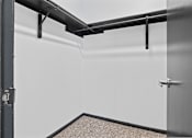 Thumbnail 30 of 45 - an empty room with a white wall and a door at Tradewinds, Windcrest