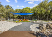 Thumbnail 17 of 60 - Shaded Lounge Area at Maxwell Townhomes, San Antonio, TX
