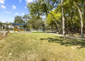 Thumbnail 19 of 60 - Shaded Lounge Area at Maxwell Townhomes, San Antonio, 78230